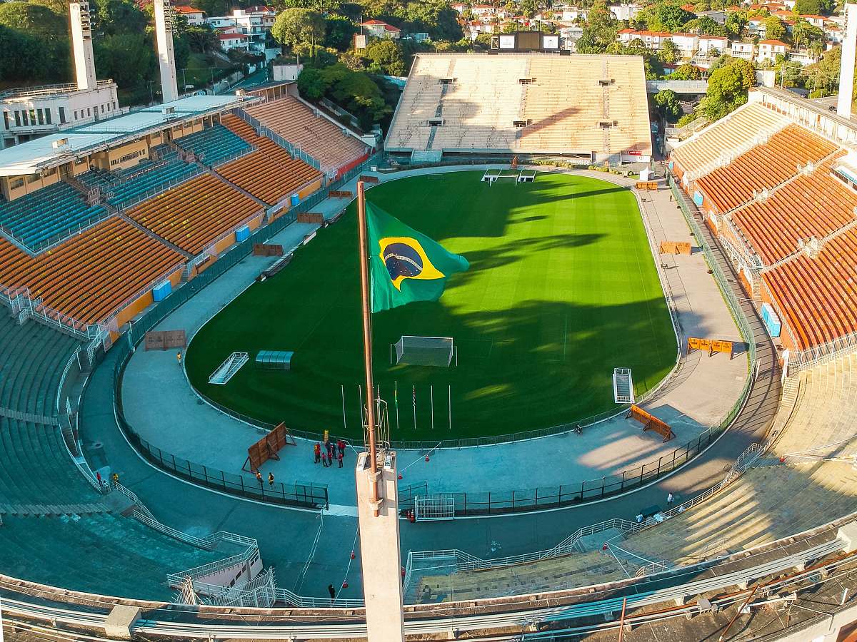 aerial view Brazil flag near soccer field at daytime praça charles miler